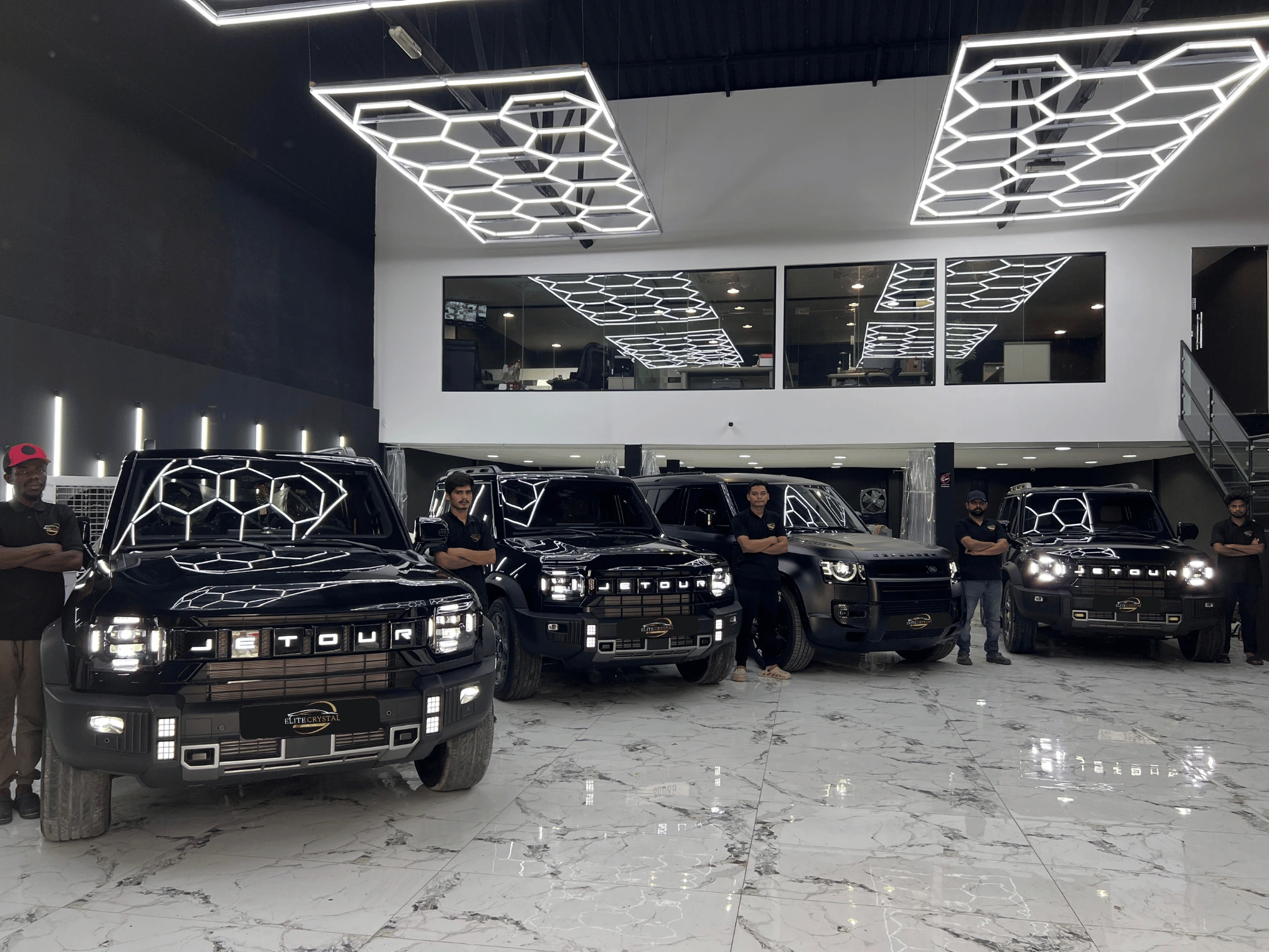 Jetours and Range Rover in Elite Crystal Car Care Showroom